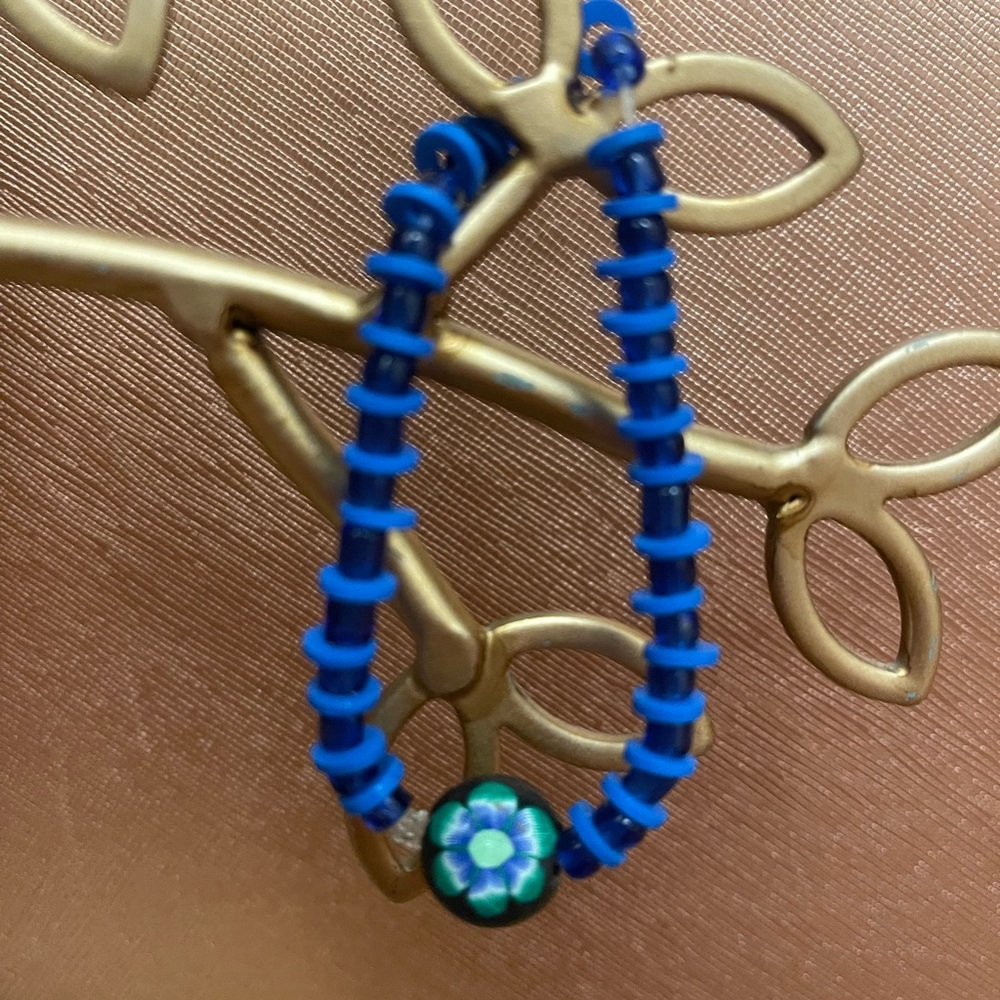 Blue Beaded Bracelet with Floral Accent